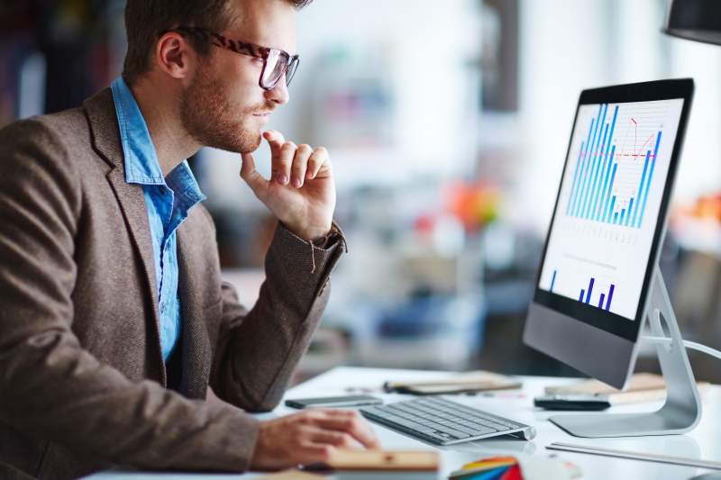 businessman considers the challenges of moving Hadoop into production
